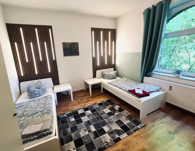 Dormitor apartament 15 cu perete LED